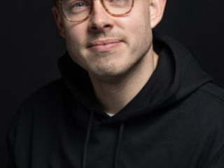 commercial headshot black background